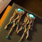 A Pair Of Vintage Blue Oval Inlaid Jellyfish Tassel Ocean Themed Earrings Suitable For Women's Daily Wear, Gifts, Dance Accessories