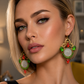One-of-a-kind handmade statement earrings featuring authentic Pahlavi-era coins, sparkling red and green crystals, and intricate vintage-inspired detailing. A unique collector’s piece by Baharnaz Gallery. Only one pair available.
